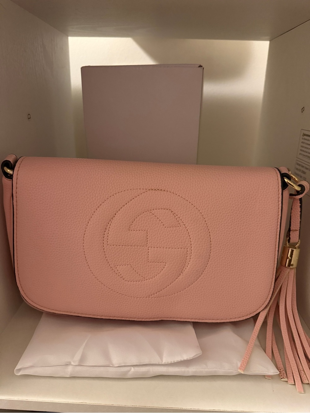 Pink Pebbled Leather Crossbody with Tassel Accent